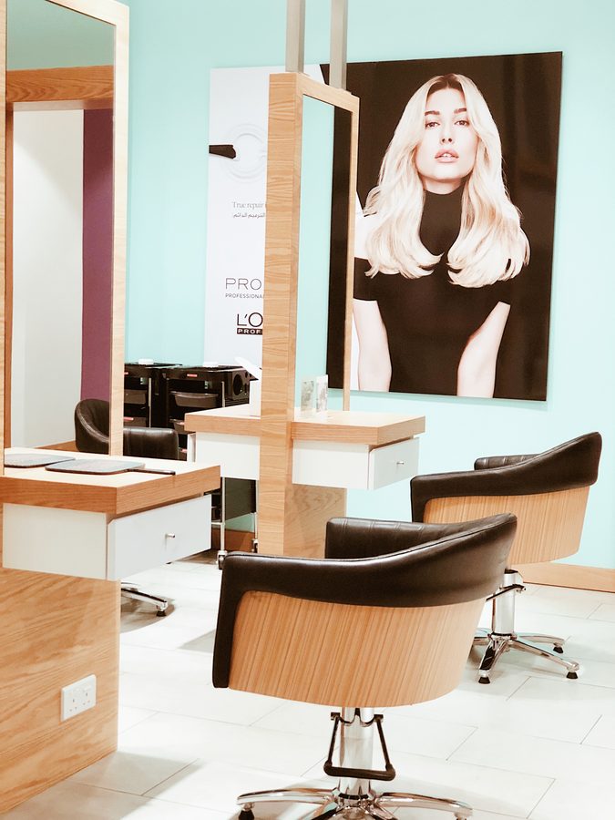 Hair styling stations with mirrors at Mimosa Beauty Lounge in Barsha Heights (TECOM), Dubai