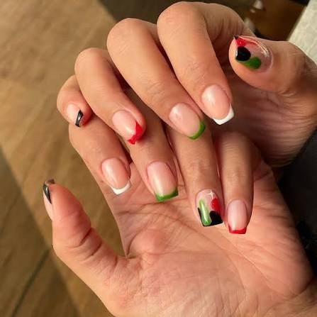 UAE National Day French tip nails in red, green, white and black